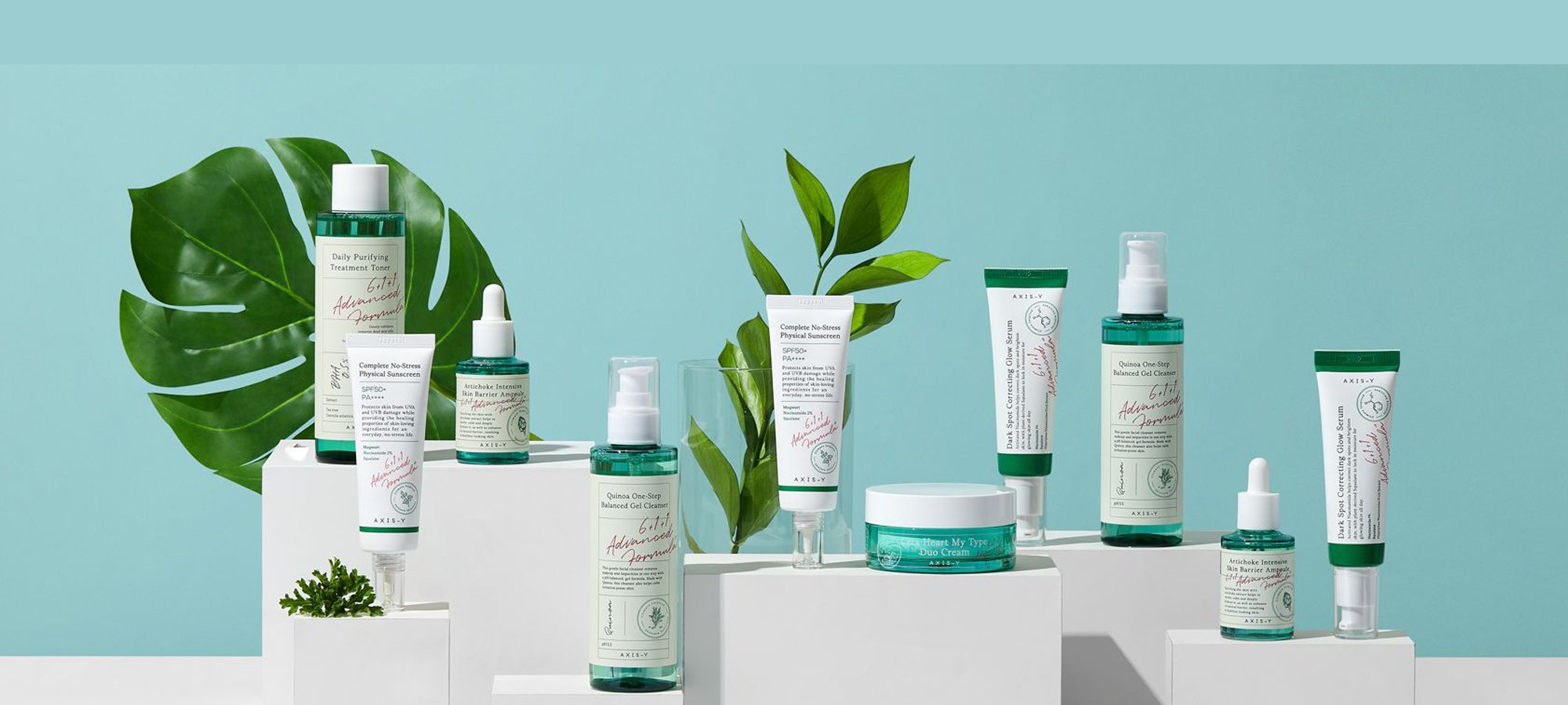 Discovering AXIS-Y: A Korean Skincare Brand Focused on Climate-Based Skincare product display with green packaging and plants