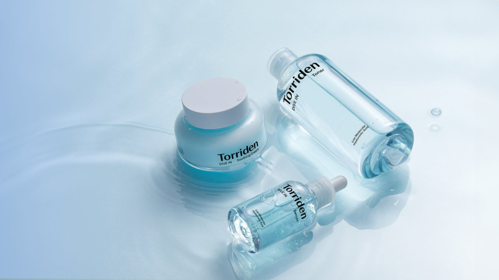 Exploring TORRIDEN The Journey to Radiant Skin Begins Here: Skincare products displayed on a soothing blue background.