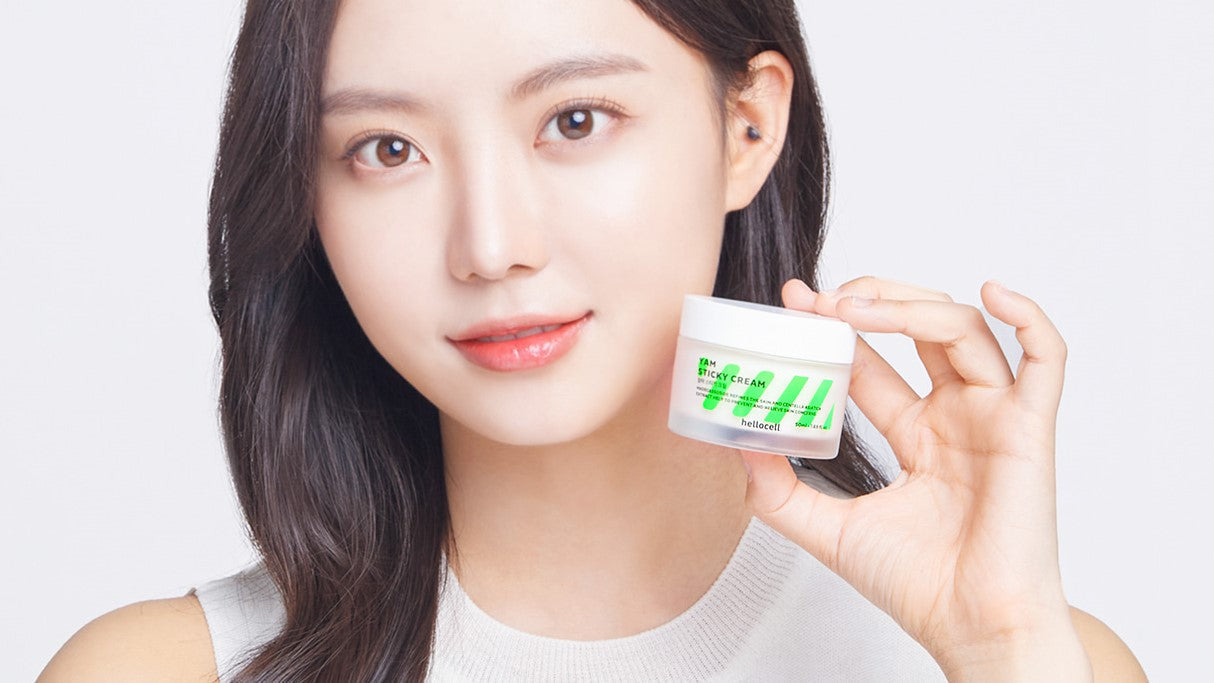 Woman holding HELLOCELL product, highlighting Unlocking the Secret to Radiant Skin: Exploring HELLOCELL's Innovative Korean Skincare.