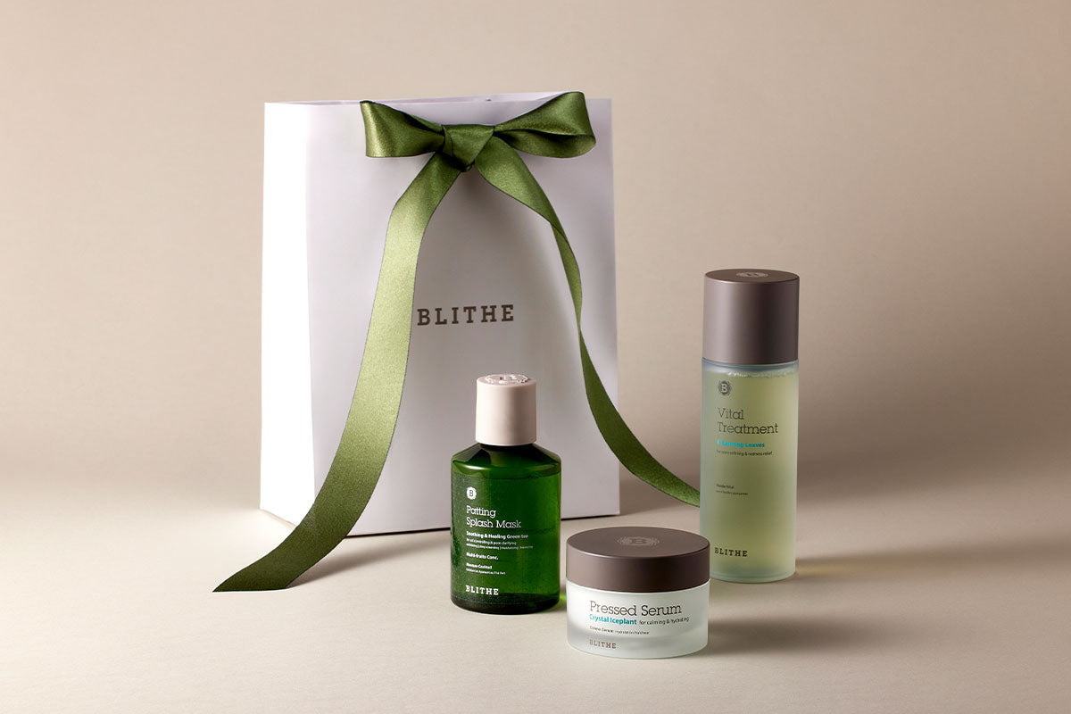 Radiant Beauty Redefined: The BLITHE Approach to Skincare - Image showing BLITHE skincare products with a ribbon-wrapped gift bag.