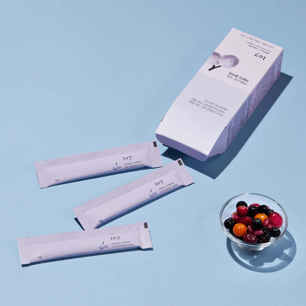 107 Aronia Vinegar Low Molecular Collagen 20g x 14 Packets shown with aronia berries on a blue background.
