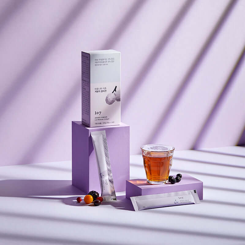 107 Aronia Vinegar Low Molecular Collagen 20g x 14 Packets displayed with tea and berries.