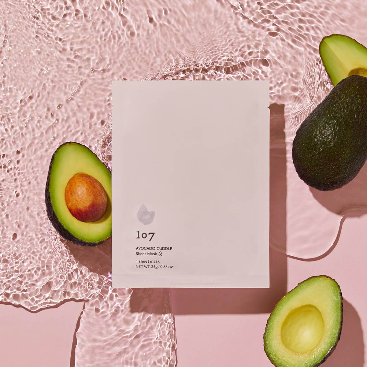 107 Avocado Curd Sheets Mask 5 Pieces displayed with avocados, featuring packaging design and natural skincare ingredients.