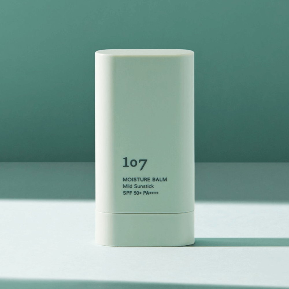 107 Moisture Balm Mild Sun Stick SPF50+PA++++ in minimalistic design, providing high sun protection in a convenient stick format