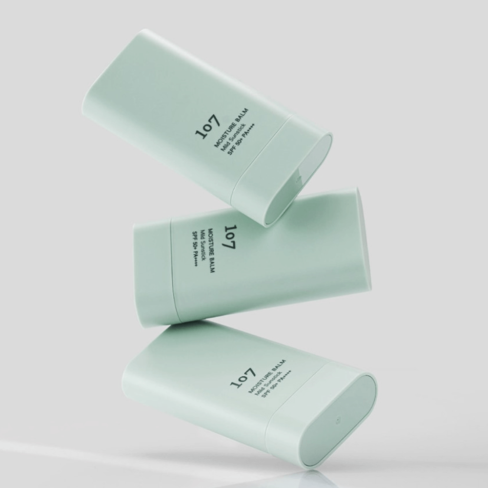 107 Moisture Balm Mild Sun Stick SPF50+PA++++ in light green packaging