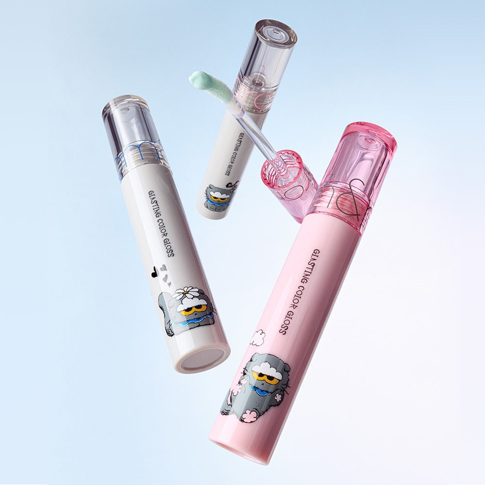 ROMAND x Joanne Friends Glasting Color Gloss tubes with playful character designs on light blue background