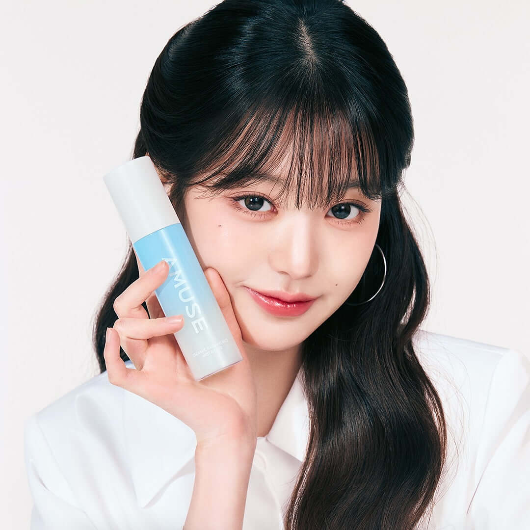 Woman holding AMUSE Ceramic White Pearl Rice Mist & Fixer 80ml