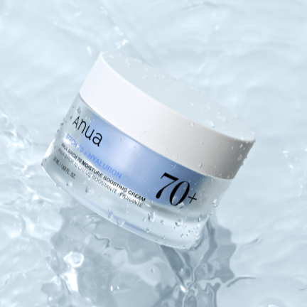 ANUA Birch 70 + Hyaluron Moisture Boosting Cream 50ml jar on a water surface