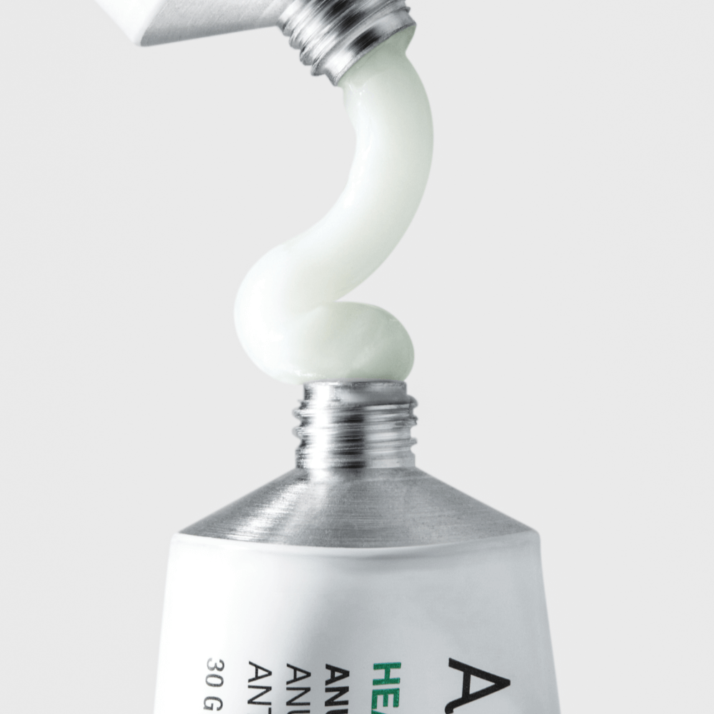 Close-up of ANUA Centella Red Spot Cream with Asungcho in a tube