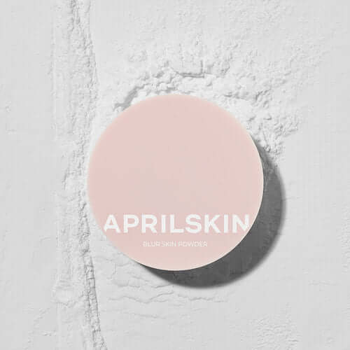 APRILSKIN Blur Skin Powder compact on textured white surface