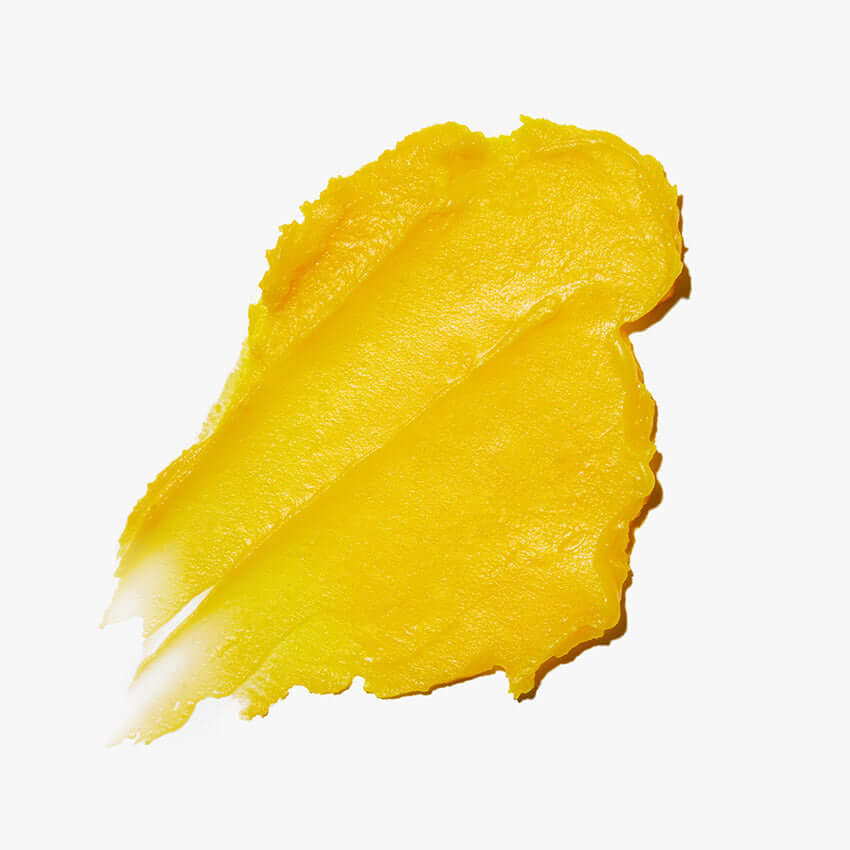 Texture of APRILSKIN Carotene Melting Cleansing Balm in bright yellow