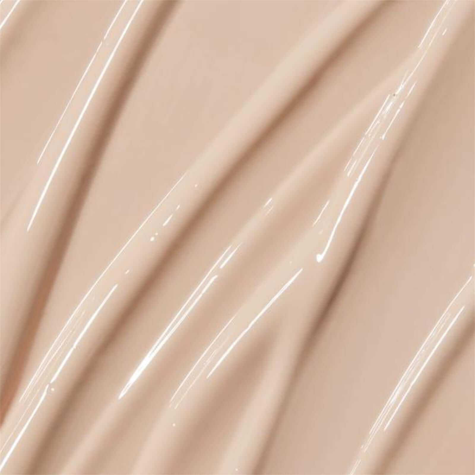Close-up of APRILSKIN Tone-Up Skin Tint texture showcasing smooth, radiant finish.