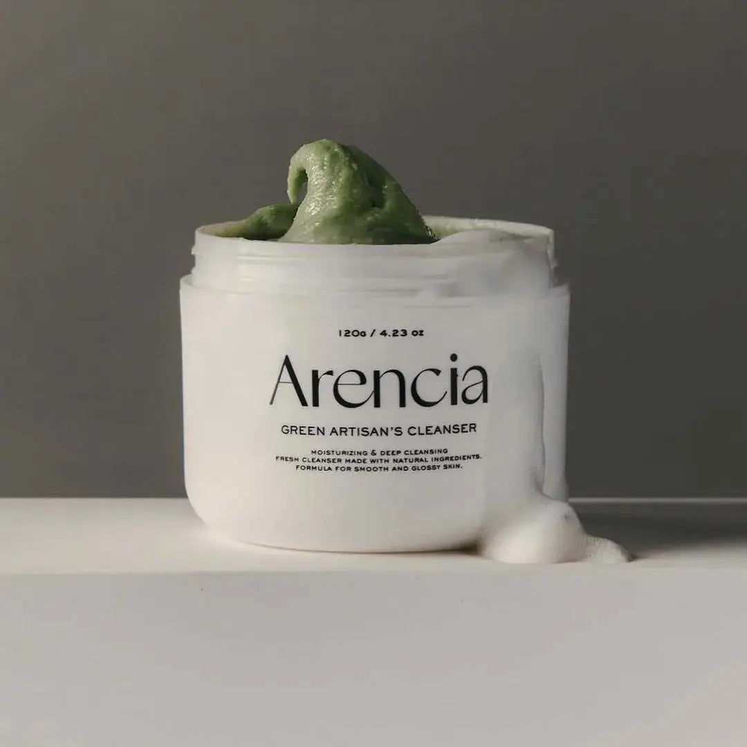 ARENCIA Green Artisan Skin Boosting Cleanser 120g in a white jar with green cleanser displayed on a neutral background.