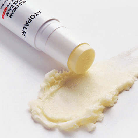 Image of ATOPALM MLE Cream Stick Balm 10g with balm texture showing smooth application benefits.
