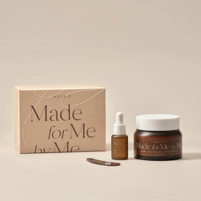 AXIS-Y Biome Recharging Night Renewal Set (Night Balm 80ml & Boosting Concentrate 8ml) displayed with packaging.