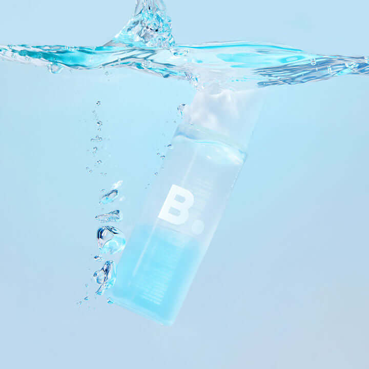 BANILA CO Lip and Eye Remover Clear bottle submerged in water