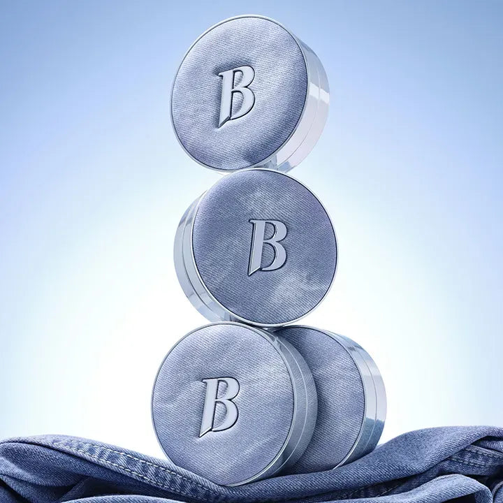 Stacked BANILACO Covericious Ultimate White Cushion compacts on blue backdrop