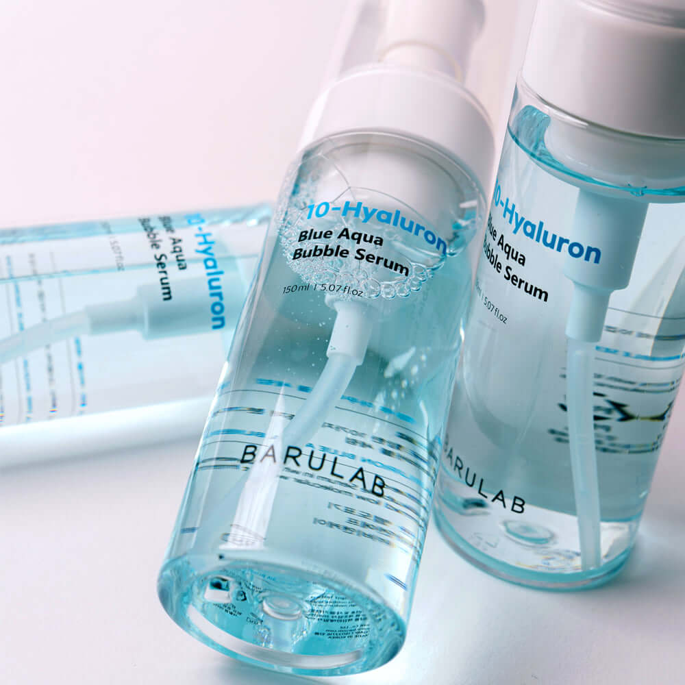 BARULAB 10-Hyaluronic Acid Blue Aqua Bubble Serum in clear bottles with pump dispensers, showcasing the serum's packaging and color.