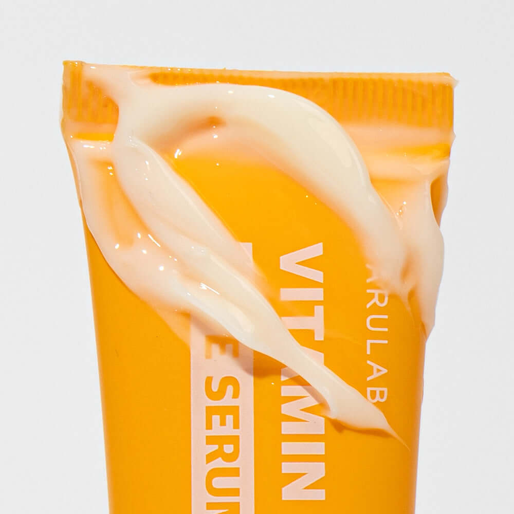 BARULAB Vitamin C Niacinamide Whitening Eye Serum 30ml with cream texture on orange tube.