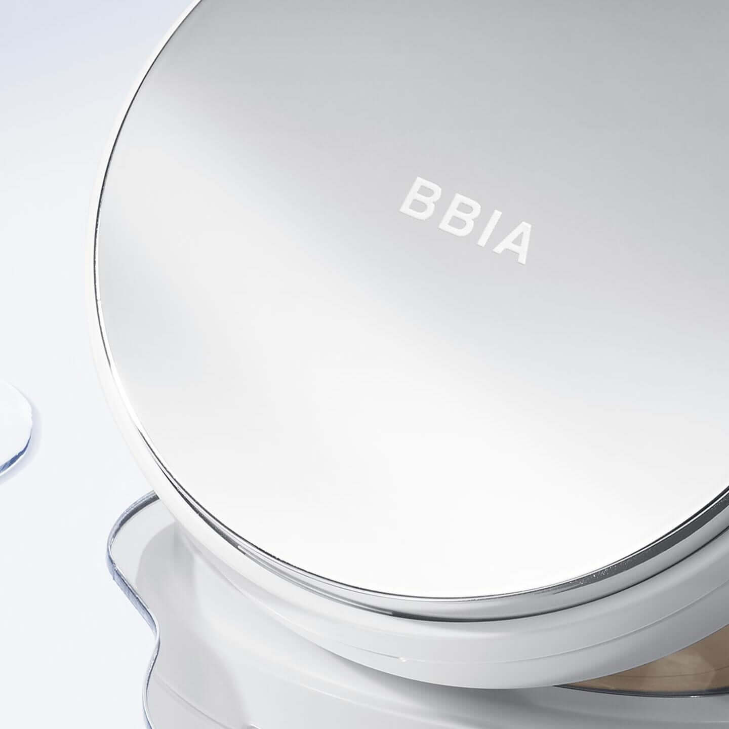 BBIA Eau Glow Cushion compact case with reflective lid on light surface
