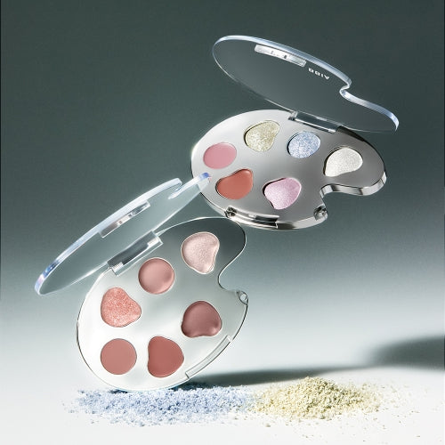 BBIA Last Eye Palette with diverse shimmer and matte shades in a unique, artistic design against a gradient background.