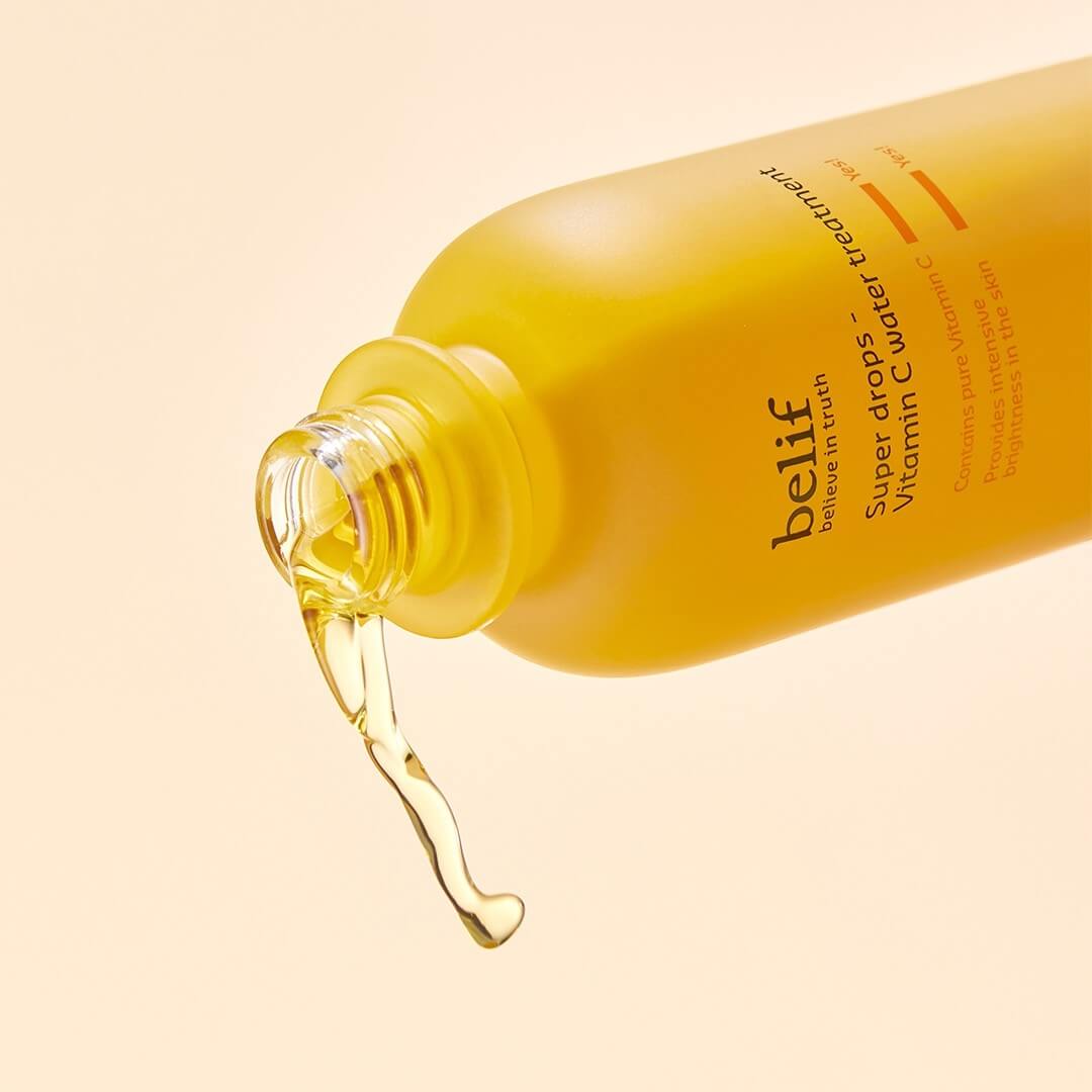 BELIF Super Drops-Vitamin C Water Treatment 150ml bottle pouring serum.