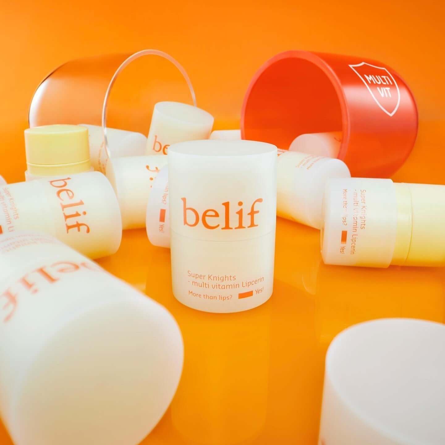 BELIF Super Knight Multi Vitamin Lipcerin collection on vibrant orange background