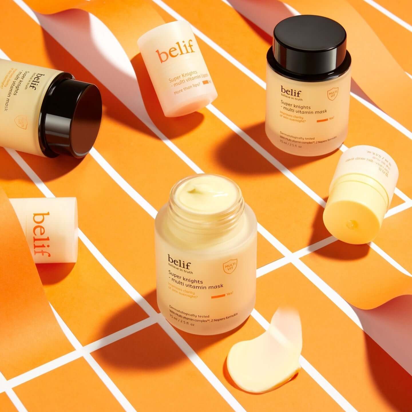 BELIF Super Knights Multi Vitamin Mask 75ml shown in aesthetically pleasing arrangement with open and closed jars on a patterned surface.