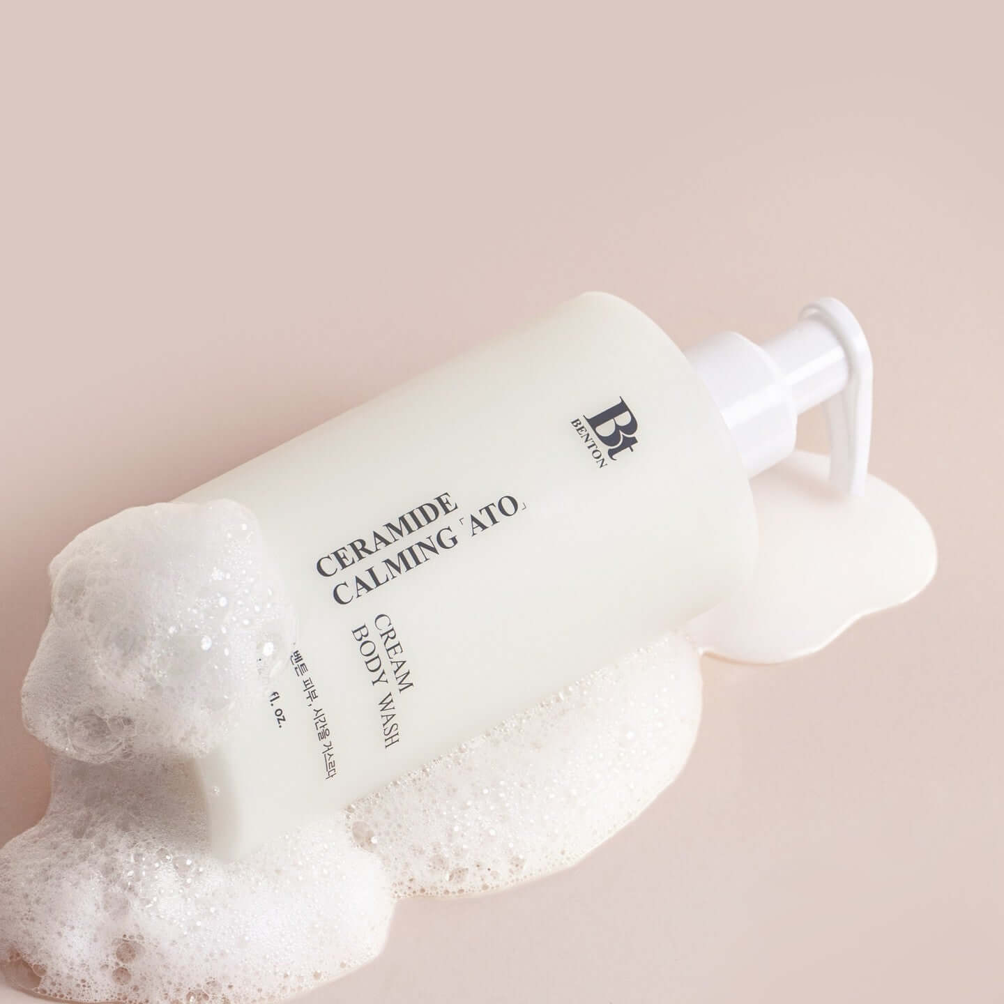 BENTON Ceramide Calming Ato Cream Body Wash 300ml bottle with foam showcasing moisturizing and soothing formula.