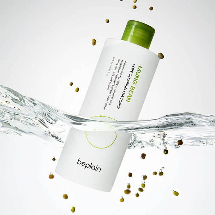 BEPLAIN Green Bean Pore Clearing LHA Toner 265ml bottle floating in water with green beans background.