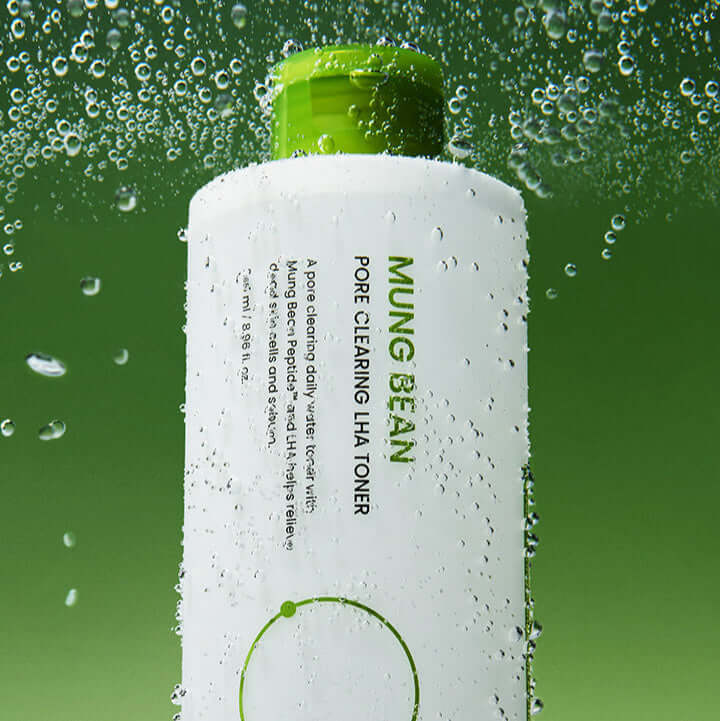 Image of BEPLAIN Green Bean Pore Clearing LHA Toner 265ml with green bubbles around the bottle