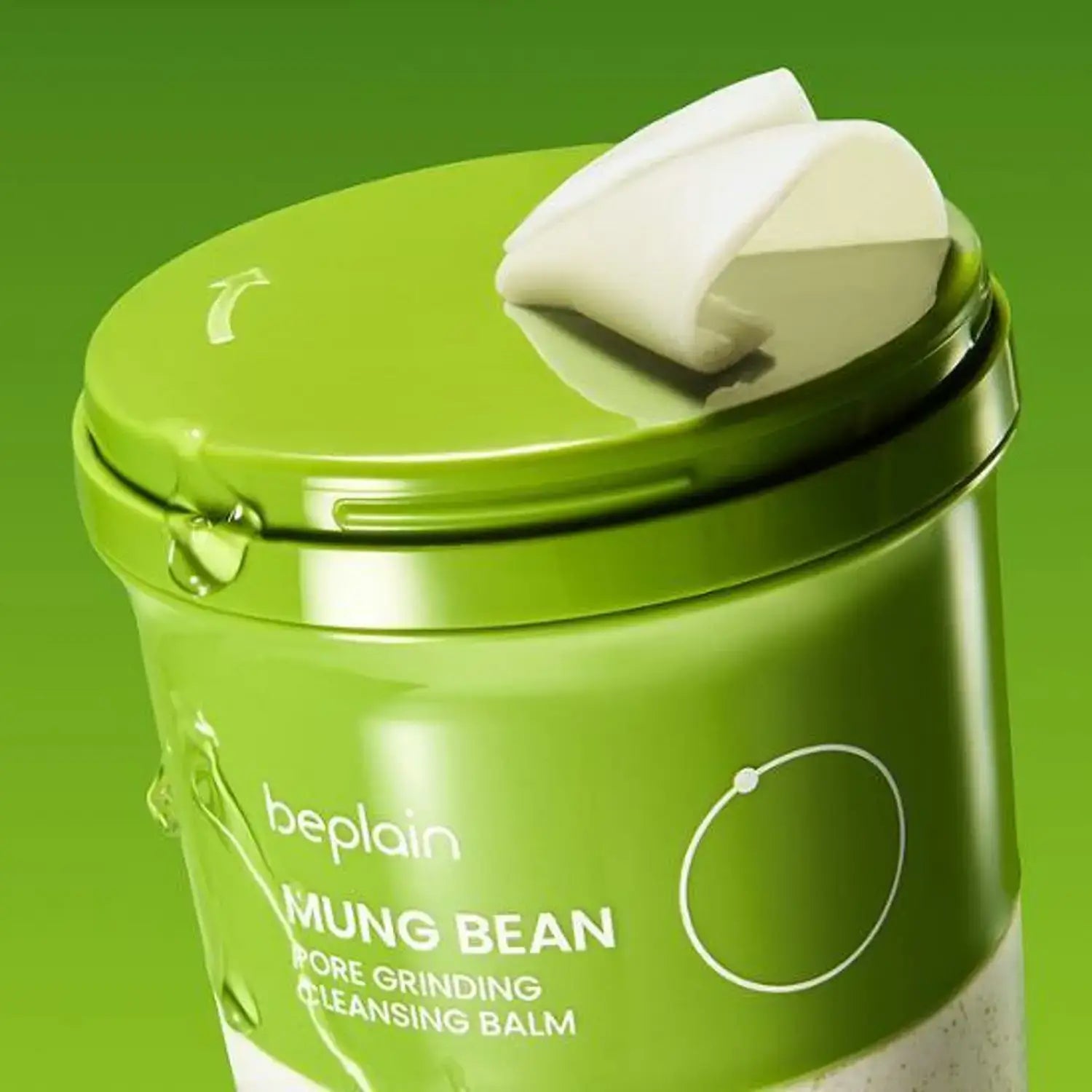 Image of BEPLAIN Green Bean Pore Grinding Cleansing Balm with a green container and white applicator, showcasing product packaging.