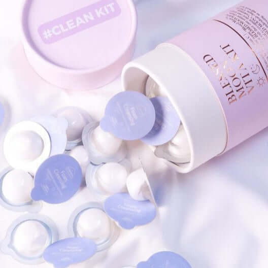 BLESSED MOON Clean Kit packaging with individual capsules on white background, highlighting skincare product design and presentation.