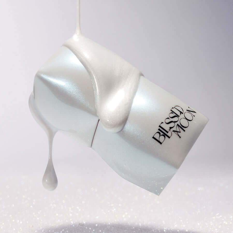 BLESSED MOON Veil Melting Glass Highlighter with silky texture, highlighting makeup beauty product.