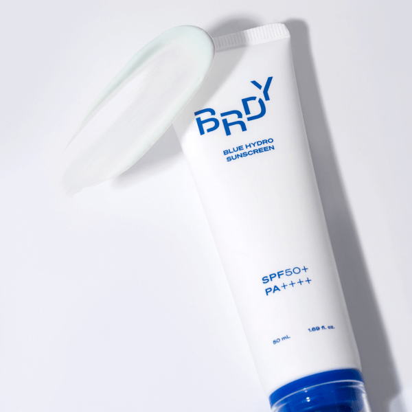 B.READY Blue Moisture Sun Cream 50ml tube with open cap, sunscreen swatch, SPF 50+ protection.