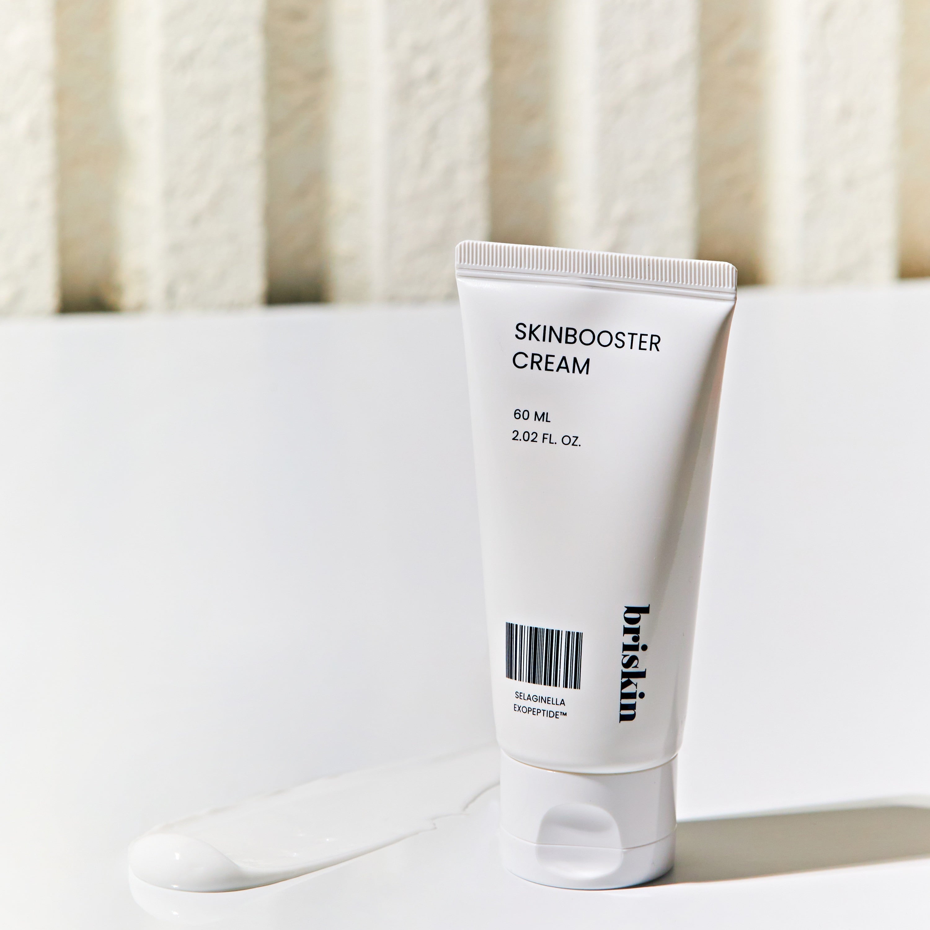 BRISKIN Selaginella Exopeptide Skin Booster Cream 60ml on white background with product texture visible