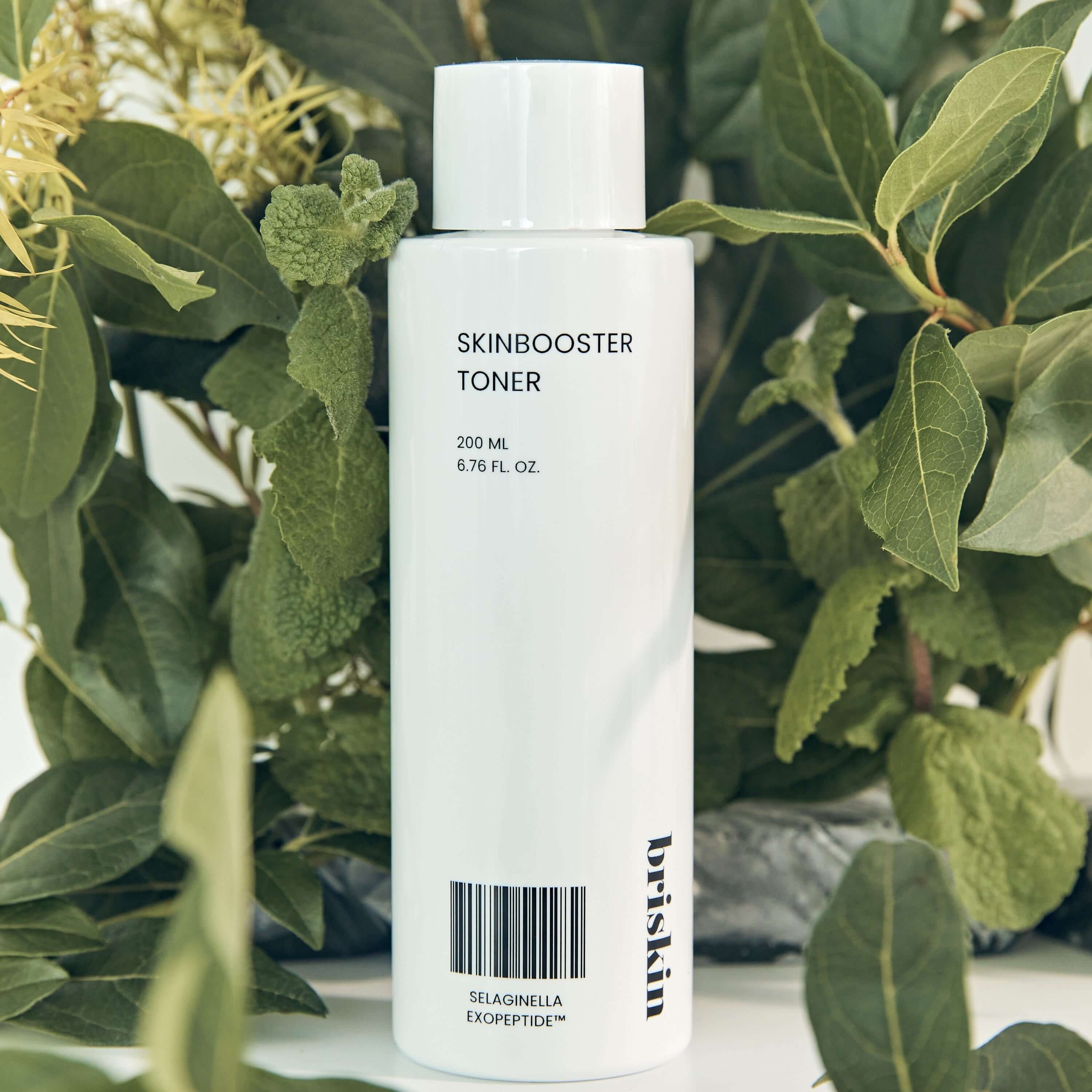 BRISKIN Selaginella Exopeptide Toner 200ml with lush green foliage background