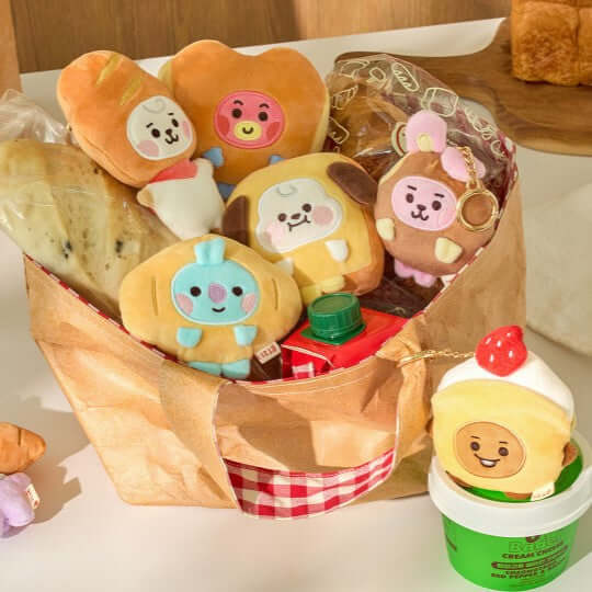 BT21 Bakery Plushy Keyring in a basket with bread and decor, showcasing various plush characters with bakery themes.