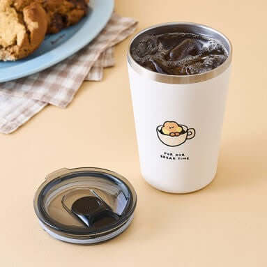 BT21 Basic Tumblr Cup 473ml, featuring a cute design, iced drink inside, and removable lid, perfect for beverages on the go.