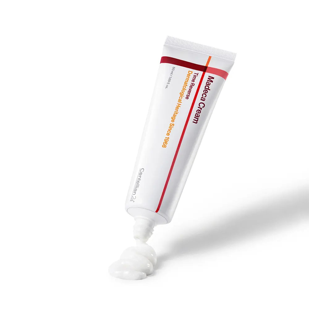 CENTELLIAN 24 Madeca Cream Time Reverse 50ml in a white tube with cream flowing out, ideal for skincare enthusiasts.