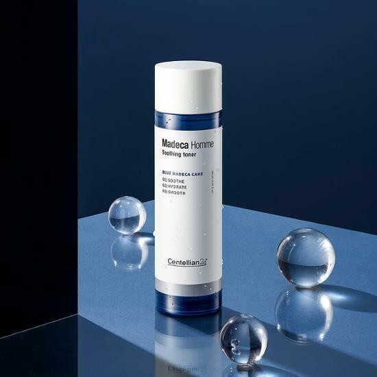 CENTELLIAN 24 Madeca Homme Soothing Toner 150ml bottle on a reflective surface with decorative glass spheres