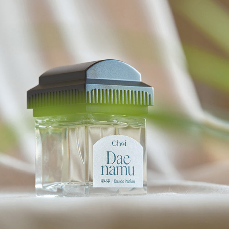 CHWI (CHI) Eau De Parfume 50ml bottle displayed on a light background with green accents.