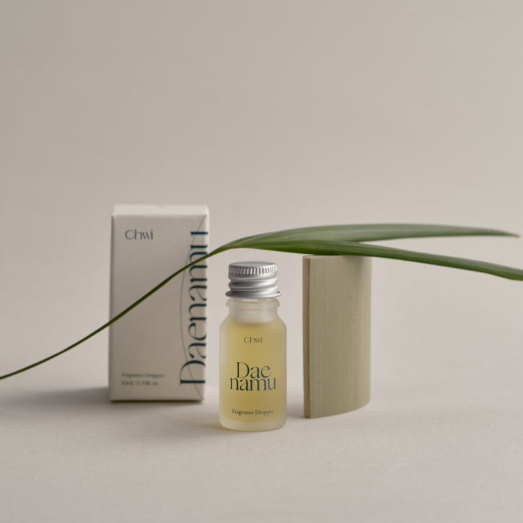 CHWI (CHI) Dae Namu Frangrance Dropper 10ml bottle with packaging and green leaf display.