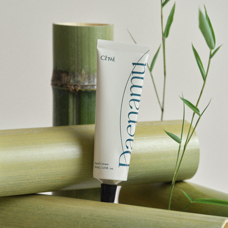 CHWI (CHI) Dae Namu Hand Cream 50ml with bamboo backdrop emphasizing natural ingredients.