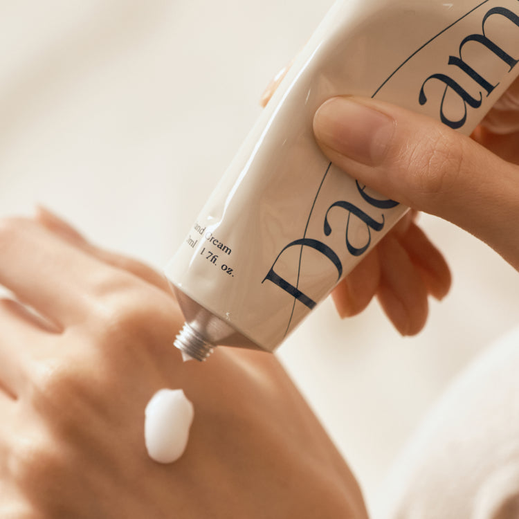 Applying CHWI (CHI) Dae Namu Hand Cream 50ml on hand for hydration