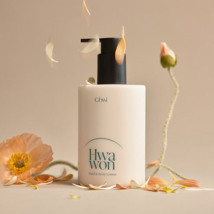 CHWI (CHI) Hwa Won Hand & Body Lotion 300ml surrounded by flowers, featuring a sleek pump bottle design.