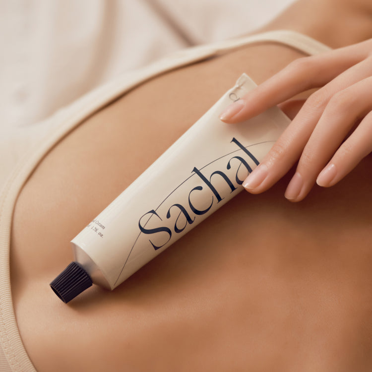 CHWI (CHI) Sachal Hand Cream 50ml on skin, showcasing packaging and texture.