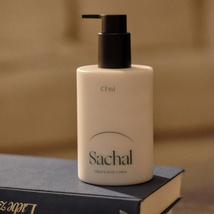 CHWI (CHI) Sachal Hand & Body Lotion 300ml bottle on a book