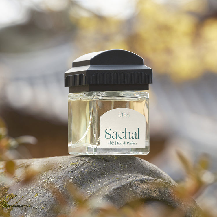 CHWI (CHI) Sachal Parfume 50ml bottle on a natural outdoor setting, showcasing its elegant design and branding.