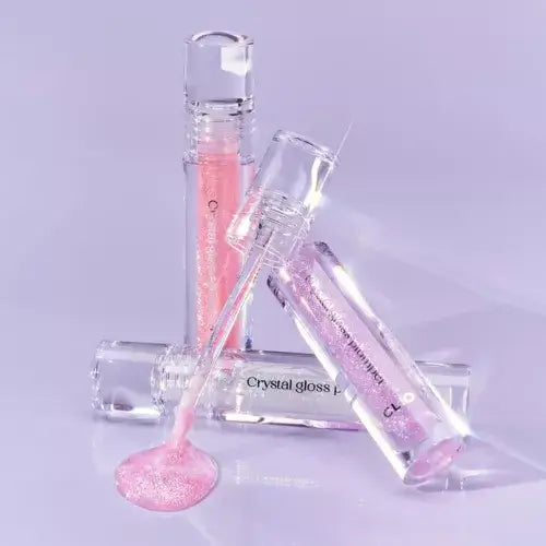 CLIO Crystal Gloss Plumper in pink shades, highlighting its shimmering gloss and skincare benefits.